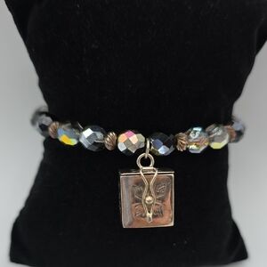 Elegant Black and Gold Charm Bracelet